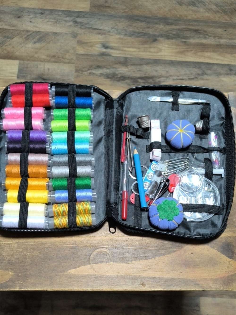 Black Portable Sewing Kit with Multicolor Thread Spools